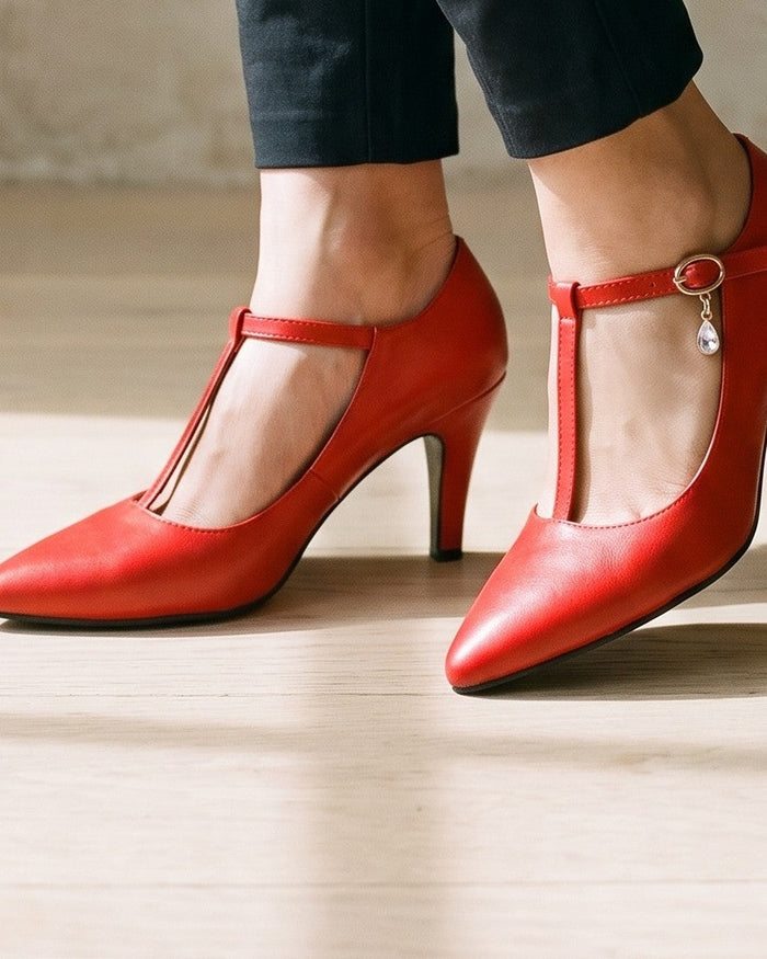 Red T-bar heels, worn