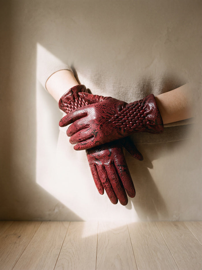 The Lost One Glove in Red, worn on both hands, held at waist height