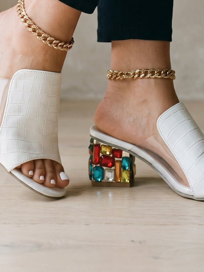 The Freya Heel in White — the shoe close, worn