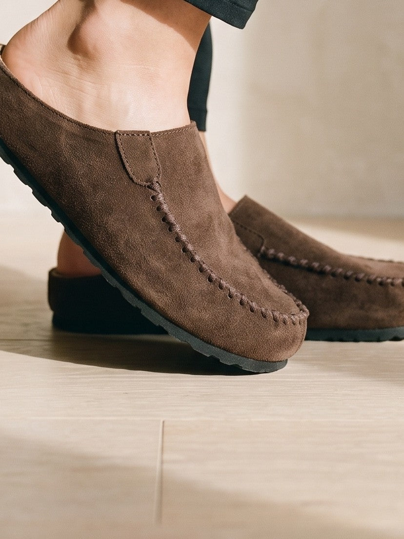 The Jemima Loafer Mule in Chocolate — the shoe close, worn