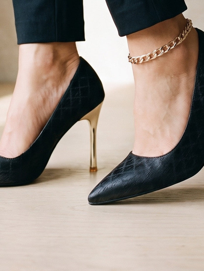 The Morag Heel in Black — the shoe close, worn
