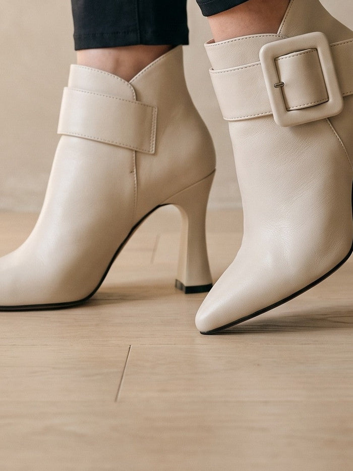 The Odette Ankle Boot in Beige — the shoe close, worn