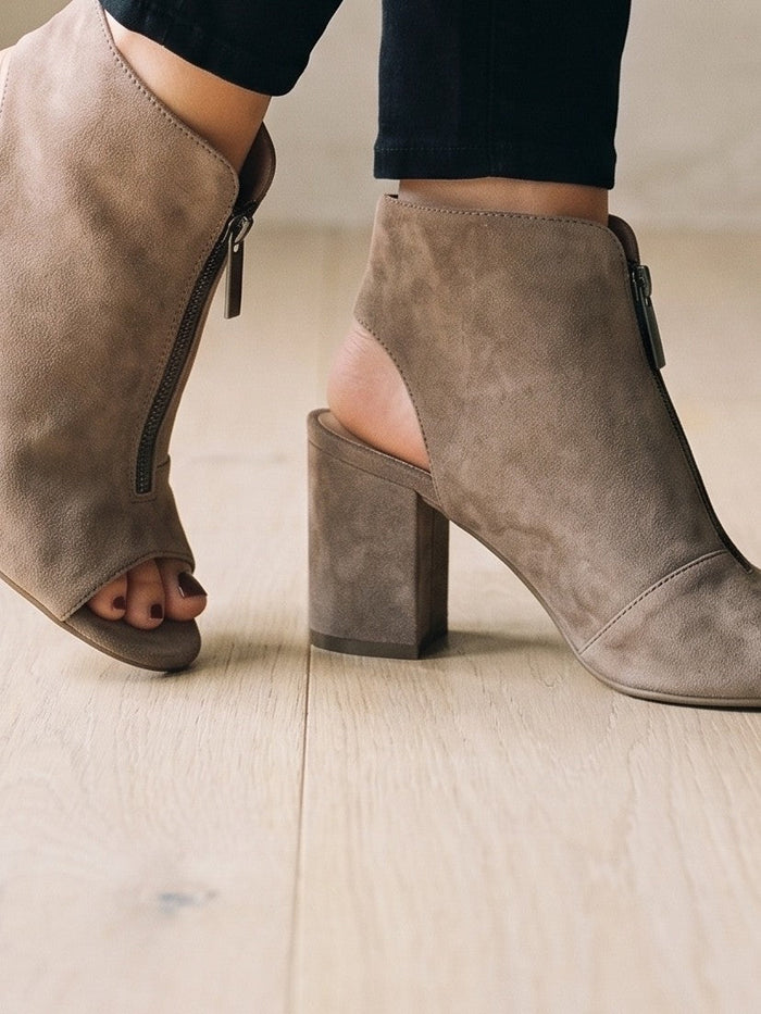 The Prue Ankle Boot in Taupe — the shoe close, worn