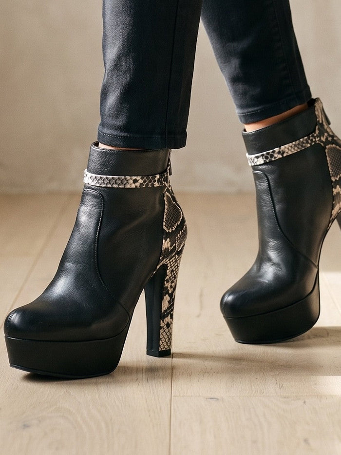 The Rue Boot in Black — the shoe close, worn