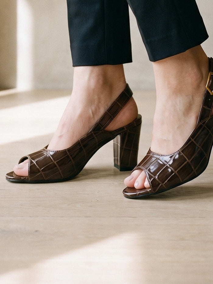 The Thomasin Slingback in Dark Brown — the shoe close, worn