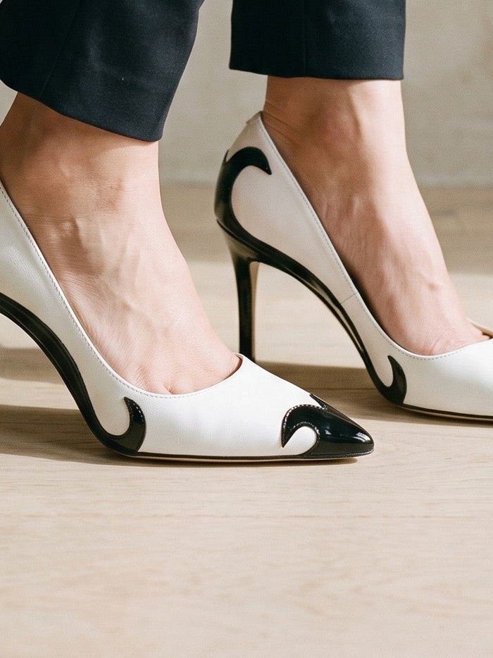 The Winifred Heel in Black — the shoe close, worn